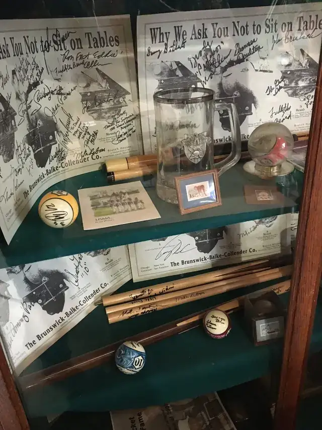 A display case of billiard memorabilia